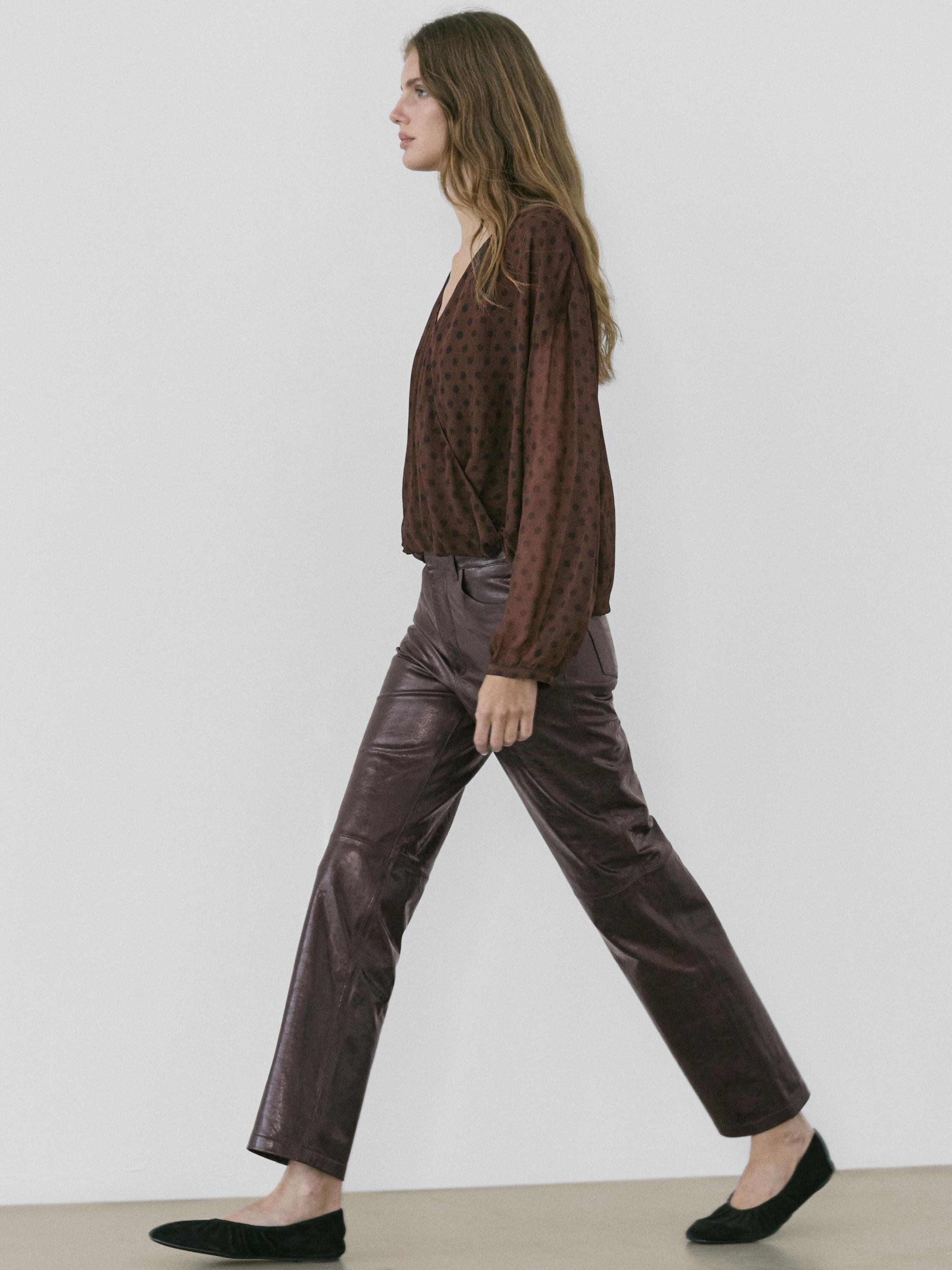 Flowing surplice polka dot blouse